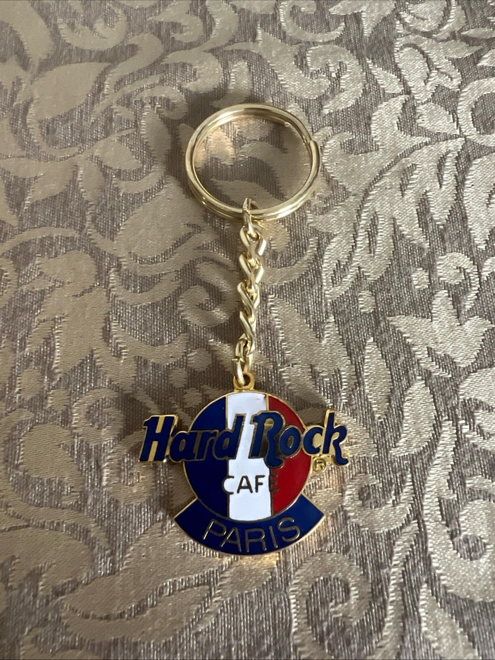 Hard Rock Cafe Paris Gold Tone Metal & Red White & Blue Enamel Keychain